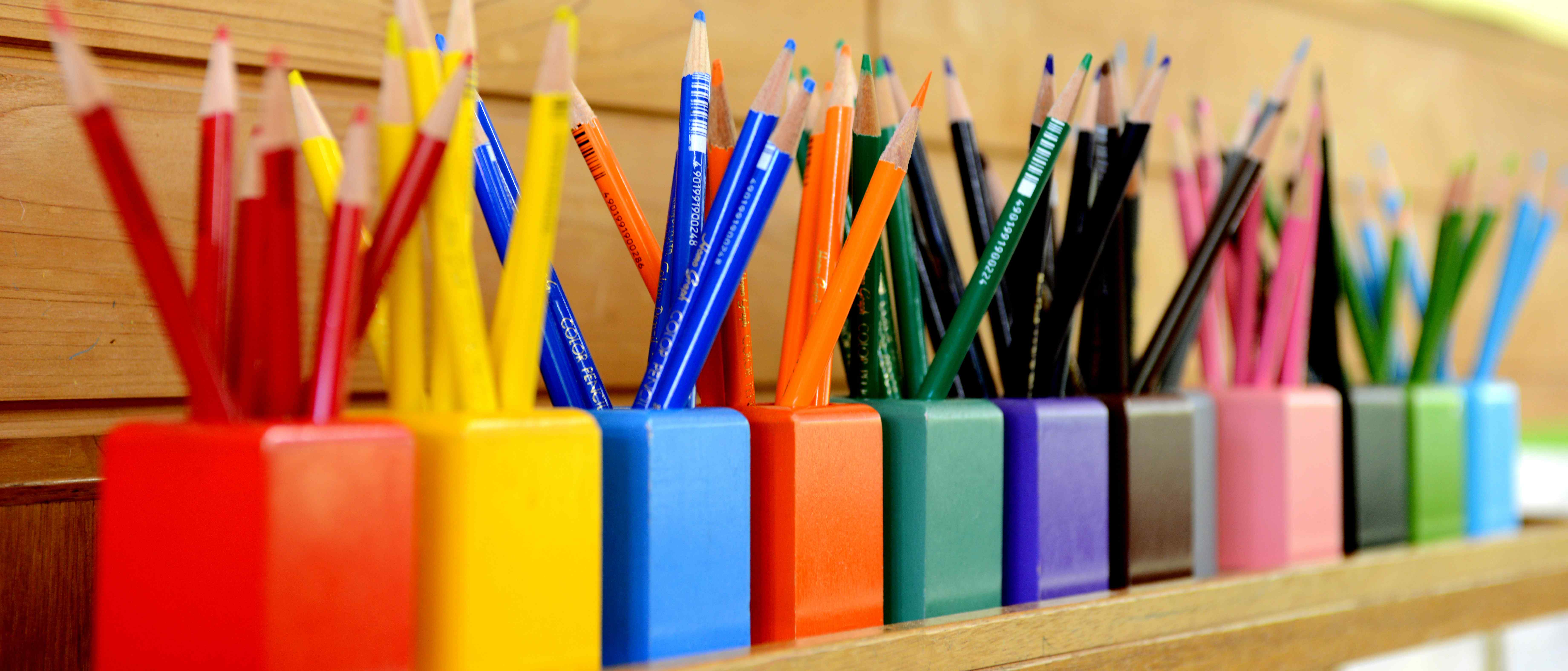 Image of a rainbow of pencils; courtesy of Shutterstock.